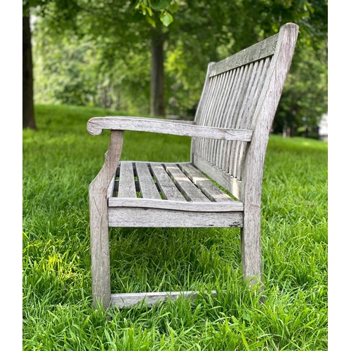 279 - GARDEN BENCH, silvery weathered teak of slatted and pegged construction, 152cm W.