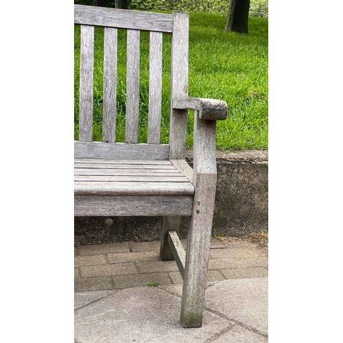 279 - GARDEN BENCH, silvery weathered teak of slatted and pegged construction, 152cm W.