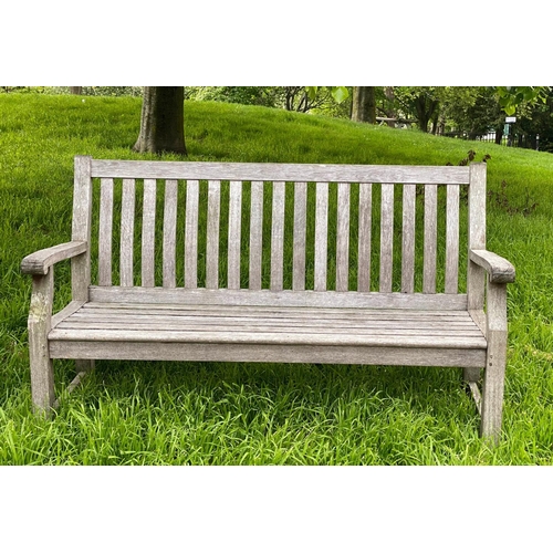 279 - GARDEN BENCH, silvery weathered teak of slatted and pegged construction, 152cm W.