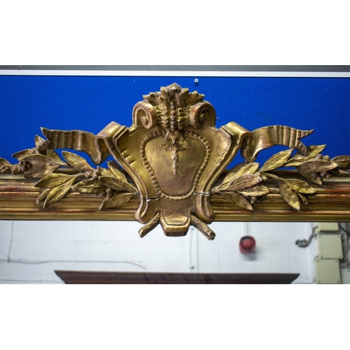 295 - OVERMANTEL, 207cm H x 140cm W, Napoleon III giltwood and gesso, with laurel leaf and cartouche crest... 