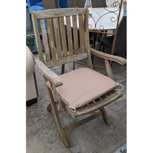 306 - BRAMBLECREST GARDEN CHAIRS, a set of four, 84cm H, and a matched extendable dining table, 29cm x 100... 