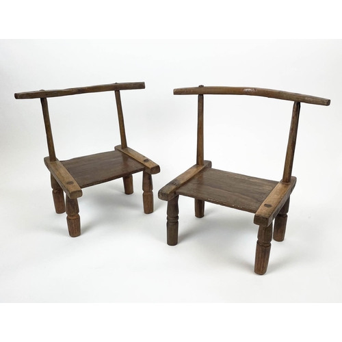 35 - DAN STOOL'S, A pair 60cm W x 60cm H, Cote d'Ivoire.