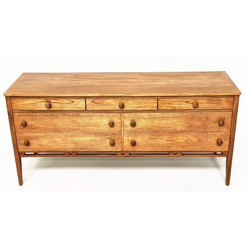 375 - LOW CHEST, mid 20th century teak with seven drawers in the manner of Heals, 148cm x 69cm H x 46cm.