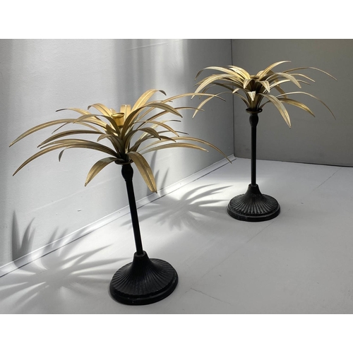 475 - PALM TREE CANDLESTICKS, a pair, 46cm high, gilt palm leaves, black stands. (2)