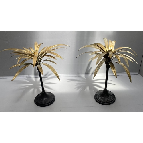 475 - PALM TREE CANDLESTICKS, a pair, 46cm high, gilt palm leaves, black stands. (2)