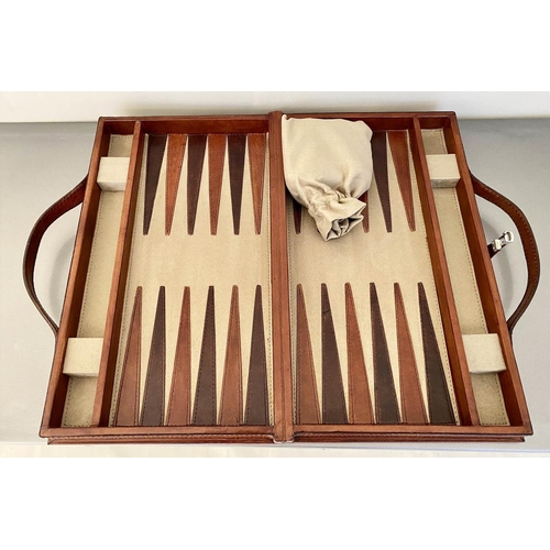 481 - BACKGAMMON SET, in leathered case, 7cm x 23cm x 40cm.