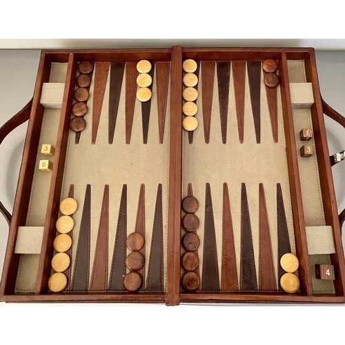 481 - BACKGAMMON SET, in leathered case, 7cm x 23cm x 40cm.