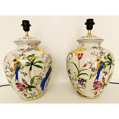 483 - TABLE LAMPS, a pair, 46cm high, 27cm diameter, glazed ceramic with floral design with birds. (2)