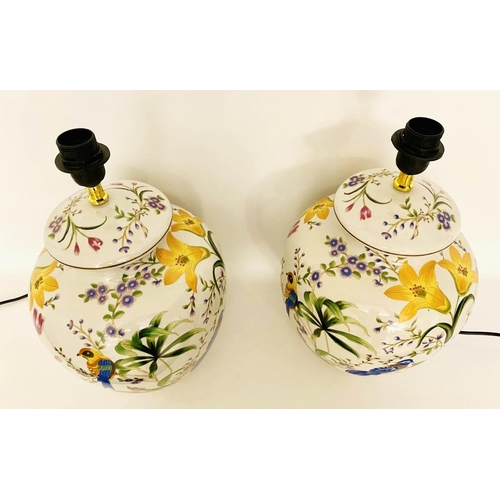 483 - TABLE LAMPS, a pair, 46cm high, 27cm diameter, glazed ceramic with floral design with birds. (2)