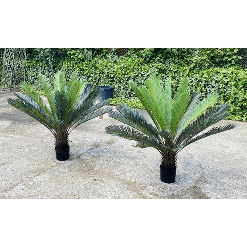 489 - FAUX FERN TREES, a pair, potted, 110cm high, 100cm wide. (2)