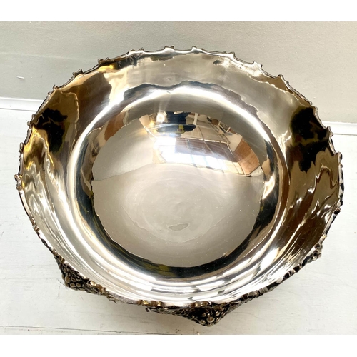 493 - CHAMPAGNE BATH, 25cm H x 37cm diam., polished metal, with grape vine detail.