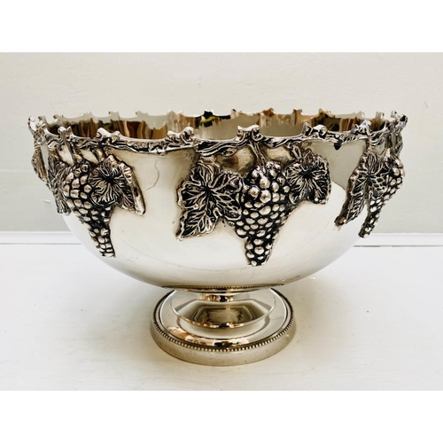 493 - CHAMPAGNE BATH, 25cm H x 37cm diam., polished metal, with grape vine detail.