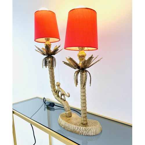 494 - TABLE LAMP, two branch, gilt metal, in the form of a monkey climbing trees, with shades, 50cm x 32cm... 