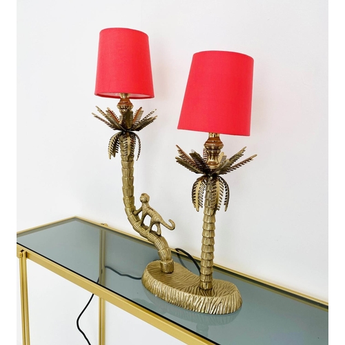 494 - TABLE LAMP, two branch, gilt metal, in the form of a monkey climbing trees, with shades, 50cm x 32cm... 