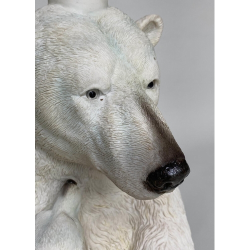 506 - POLAR BEAR TABLE, circular glazed on polar bear and cub support, 47cm W x 52cm H.