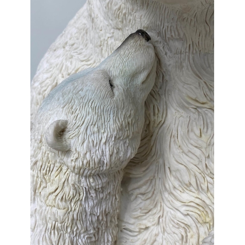 506 - POLAR BEAR TABLE, circular glazed on polar bear and cub support, 47cm W x 52cm H.