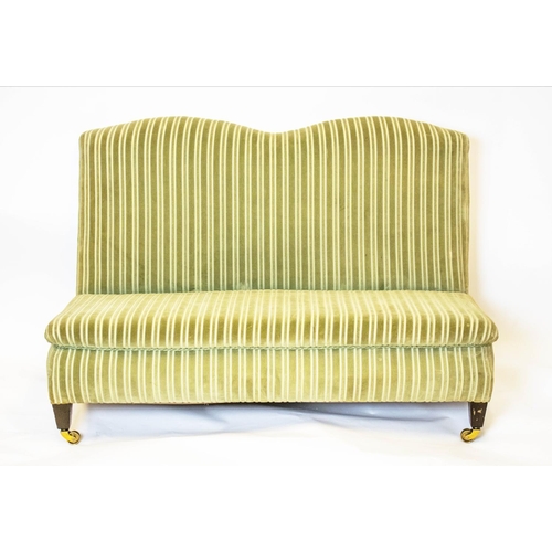 533 - LOW BANQUETTE, striped green velvet on brass castors, 72cm H x 110cm.