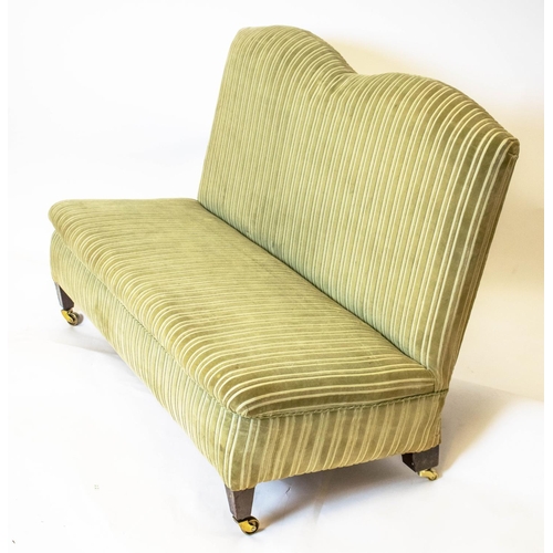 533 - LOW BANQUETTE, striped green velvet on brass castors, 72cm H x 110cm.