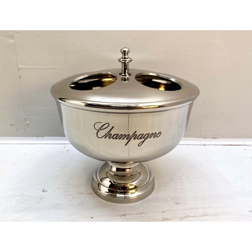 545 - CHAMPAGNE BATH, 40cm high, 36cm diameter, four sectioned, polished metal.