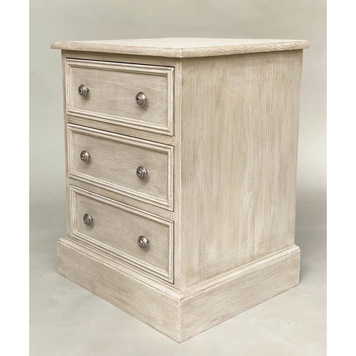 556 - BEDSIDE CHESTS, a pair, traditionally grey painted each with three drawers, 57cm W x 40cm D x 60cm H... 