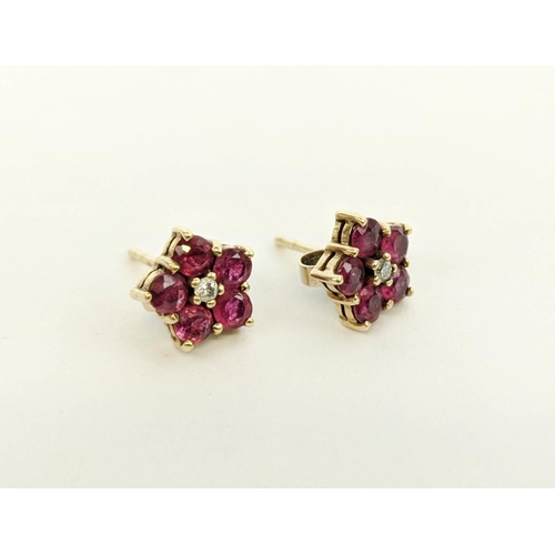 6 - A 9CT GOLD HORSESHOE BROOCH, set with seed pearls; a pair of 9ct gold ruby set stud earrings, with t... 