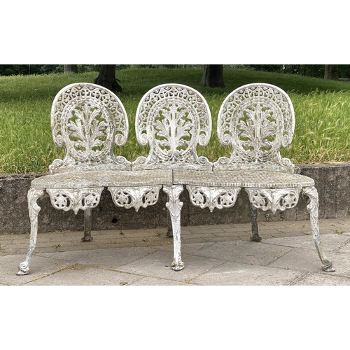 105 - GARDEN BENCH, well weathered cast aluminium white painted and pierced, 135cm W.