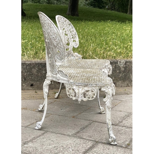 105 - GARDEN BENCH, well weathered cast aluminium white painted and pierced, 135cm W.