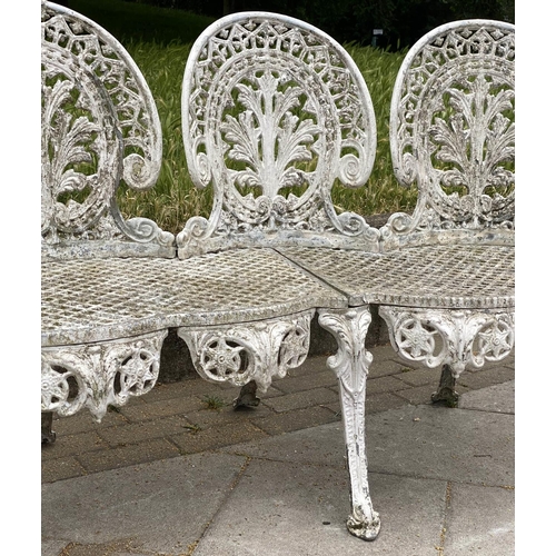 105 - GARDEN BENCH, well weathered cast aluminium white painted and pierced, 135cm W.