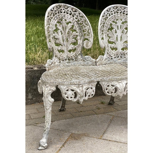 105 - GARDEN BENCH, well weathered cast aluminium white painted and pierced, 135cm W.