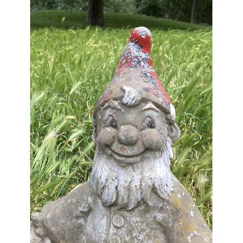 110 - GARDEN GNOME PLANTERS, a pair, weathered reconstituted stone with traces of colour, 35cm W x 41cm H.... 