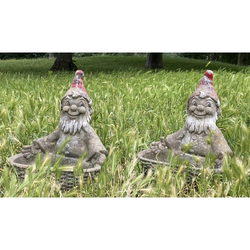 110 - GARDEN GNOME PLANTERS, a pair, weathered reconstituted stone with traces of colour, 35cm W x 41cm H.... 