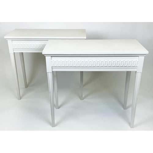 162 - HALL TABLES, a pair, Gustavian design, white painted finish, 78cm H x 85cm W x 40cm. (2)