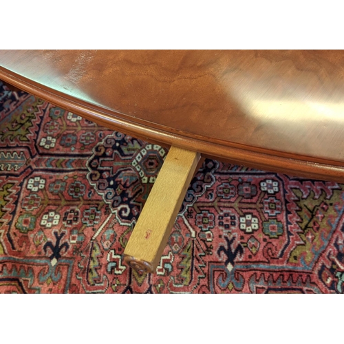 179 - BEVAN FUNNELL EXTENDING DINING TABLE, Georgian style mahogany with six extra leaves on brass castors... 