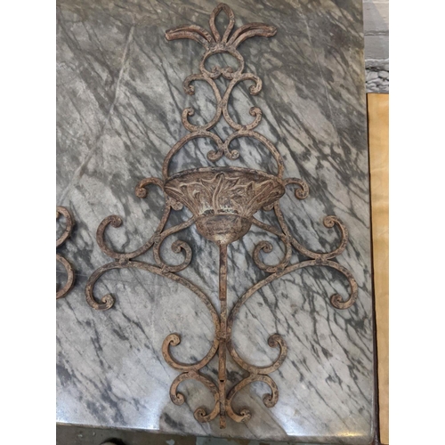 18 - WALL SCONCES, each 52cm H x 31cm W, iron a set of four in an antiqued finish.