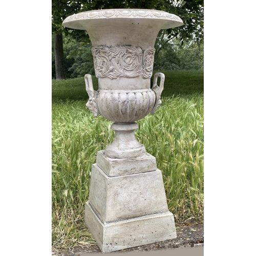 108 - GARDEN URNS, a pair, cast iron of campana form on square stepped plinths, 46cm W x 90cm H. (2)