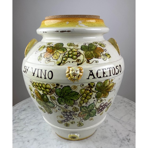 7 - TUSCAN ORCIO, modelled as a wine urn, hand painted with grape vines and inscribed 'Sy vino acetoso' ... 