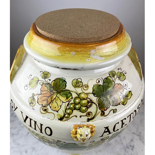 7 - TUSCAN ORCIO, modelled as a wine urn, hand painted with grape vines and inscribed 'Sy vino acetoso' ... 