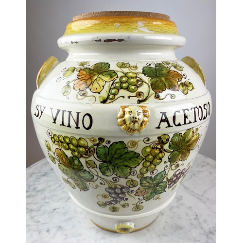 7 - TUSCAN ORCIO, modelled as a wine urn, hand painted with grape vines and inscribed 'Sy vino acetoso' ... 