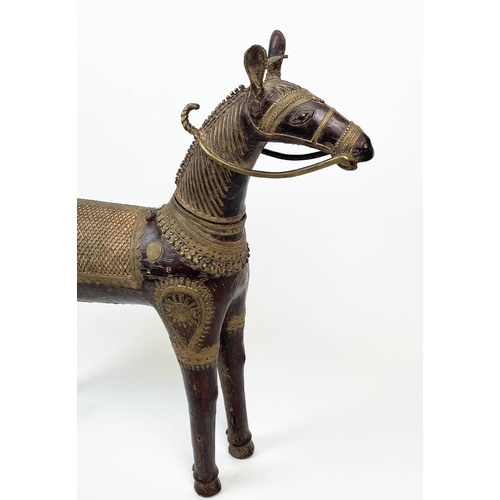 9 - INDIAN BRONZE HORSE, embellished with saddle and decorative detail, 90cm L x 74cm H.