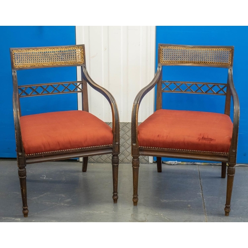 135 - OPEN ARMCHAIRS, pair, Regency design, mahogany, canework backs, lattice crossbars, red upholstered s... 