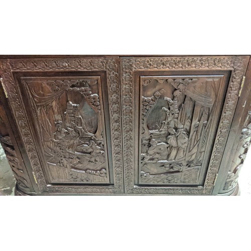 144 - CHINESE BAR, 104cm H x 91cm W 44cm D, with a rising lid and fall front heavily carved all over.