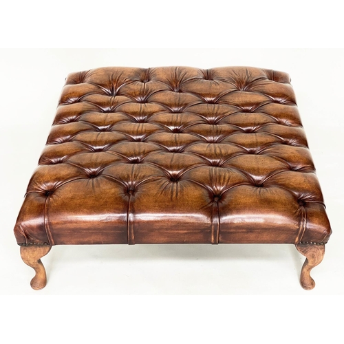 117 - CENTRE STOOL, large rectangular deep buttoned tan brown leather, brass studded and with shaped suppo... 