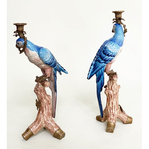 119 - PARROT CANDLESTICKS, a pair, Continental style painted porcelain and gilt metal mounted, 51cm H. (2)