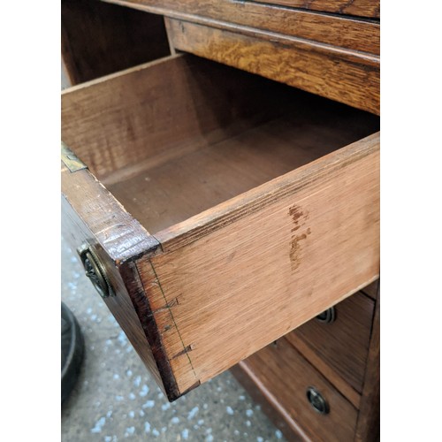 132 - PEDESTAL DESK, 76cm H x 120cm W x 64cm D, Victorian oak with green leather top and nine drawers on c... 