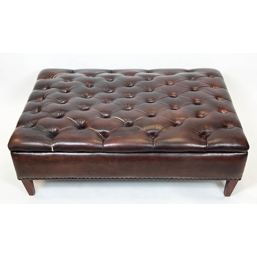 115 - OTTOMAN, buttoned hand dyed tan leather with rising lid, raised on square supports, 40cm H x 120cm x... 