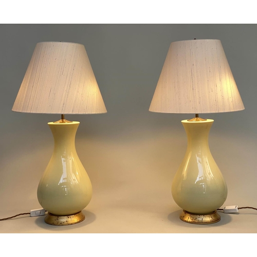 119 - TABLE LAMPS, a pair, 'Louisa' lemon yellow glazed ceramic of vase form with giltwood bases and spun ... 