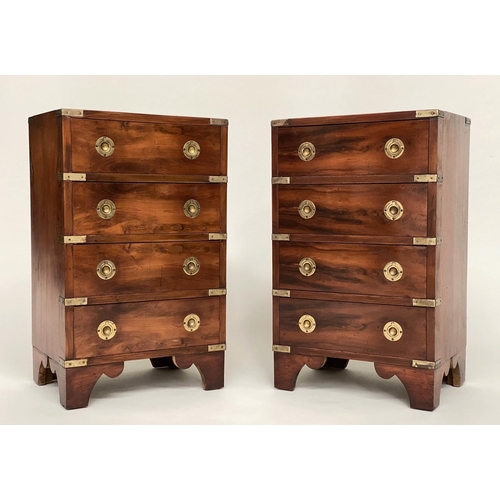 122 - CAMPAIGN STYLE BEDSIDE CHESTS, a pair, campaign style mahogany and brass bound each with four drawer... 