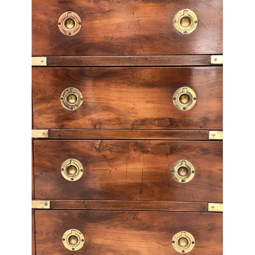 122 - CAMPAIGN STYLE BEDSIDE CHESTS, a pair, campaign style mahogany and brass bound each with four drawer... 