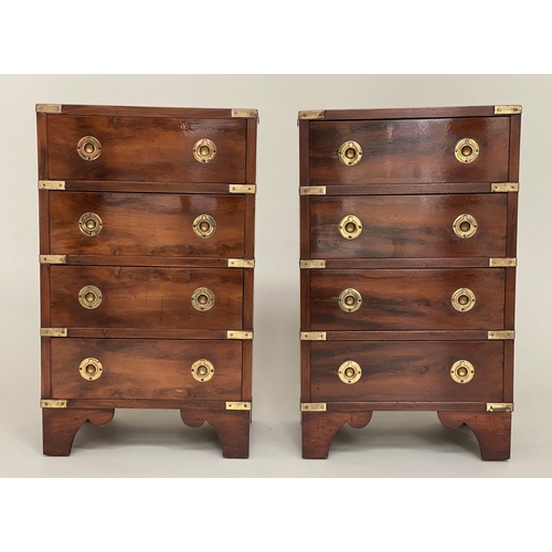 122 - CAMPAIGN STYLE BEDSIDE CHESTS, a pair, campaign style mahogany and brass bound each with four drawer... 