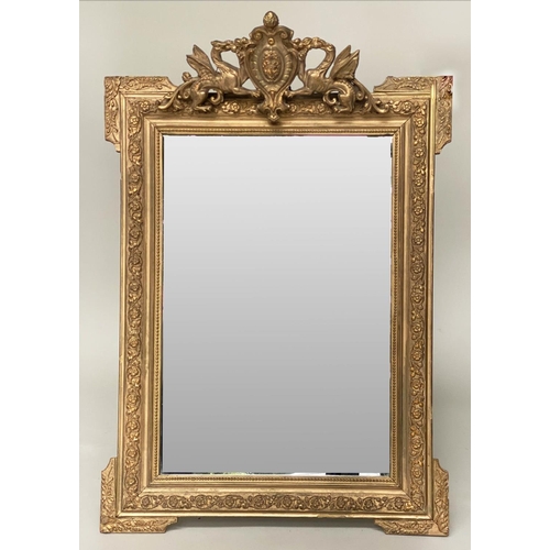 128 - WALL MIRROR, late 19th/early 20th century French giltwood and gesso moulded with griffin and shield ... 